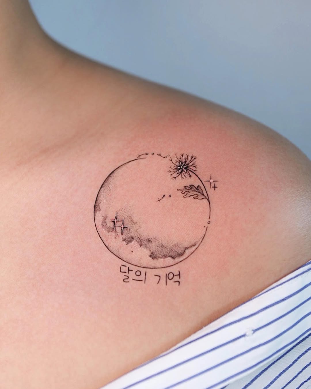 Enchanting moon and dandelion tattoo design