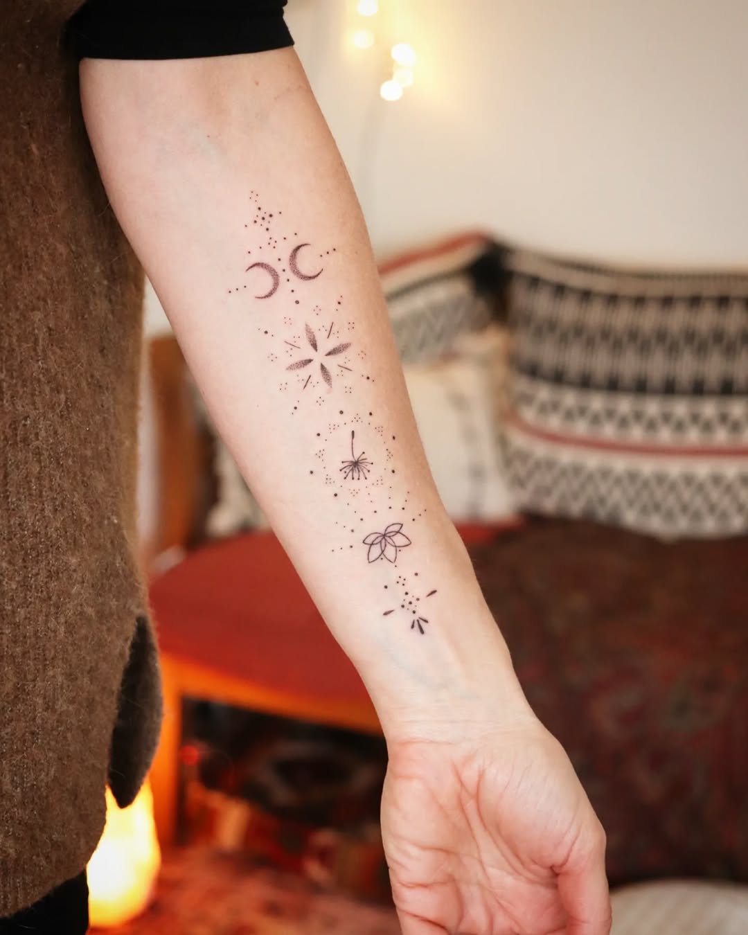 Whimsical Dandelion Tattoo with Celestial Elements