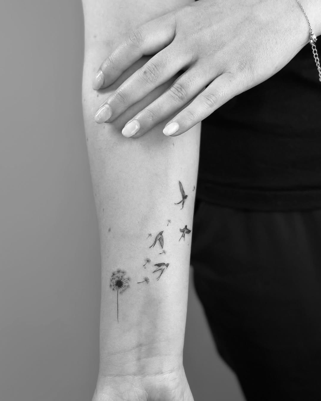 Dandelion tattoo with birds in flight