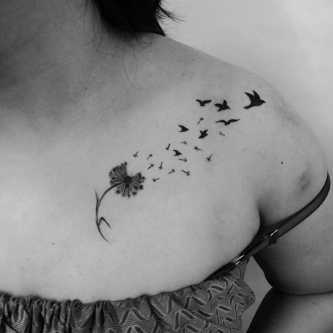 Dandelion tattoo with birds in flight