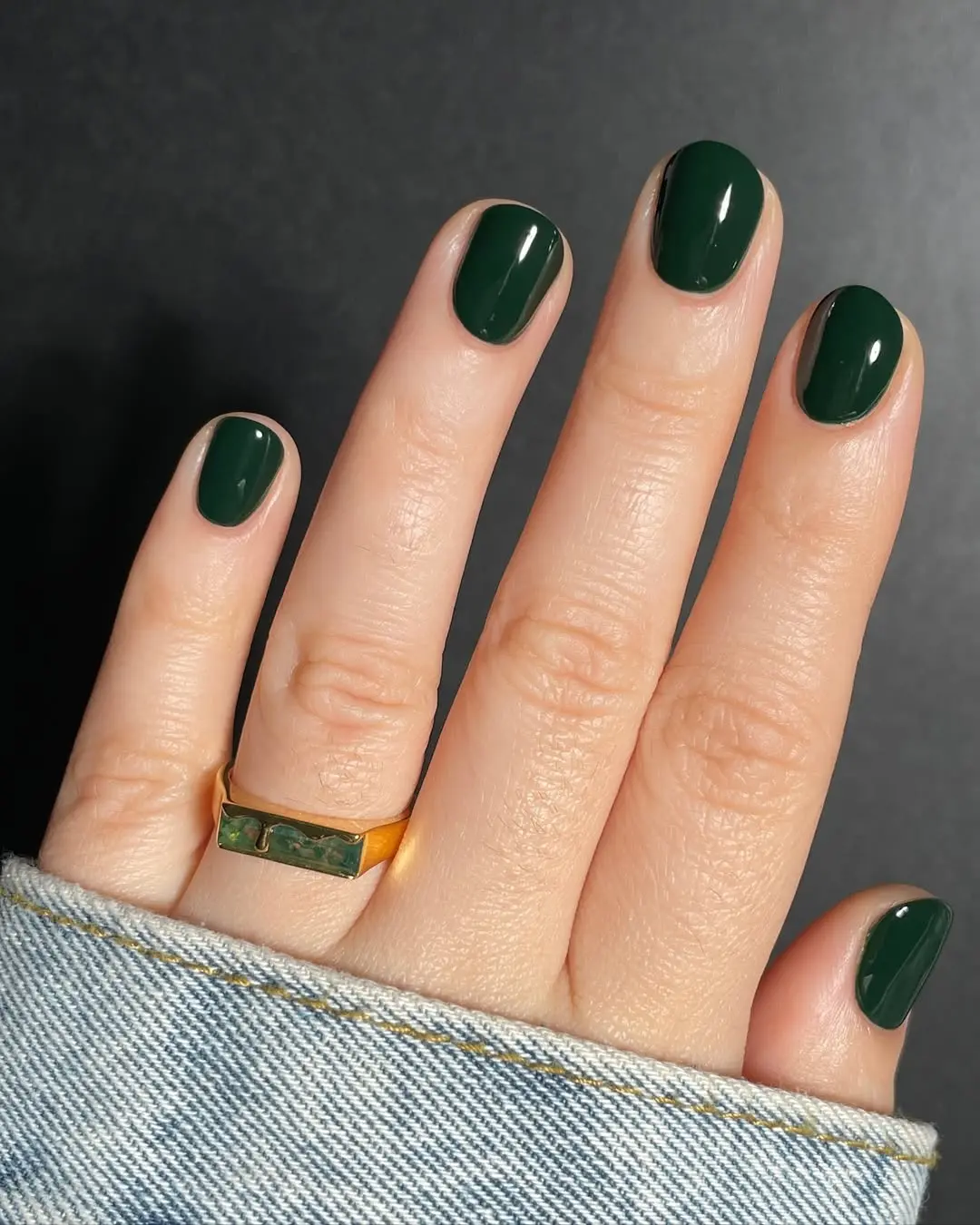 Chic Dark Green Nail Design with Accessories