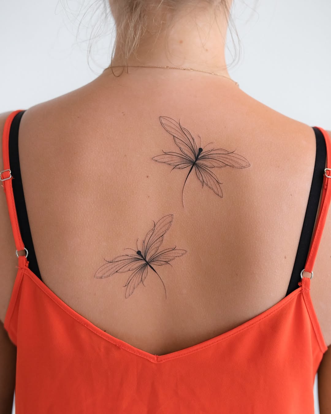 Intricate Dragonfly Tattoos on the Back