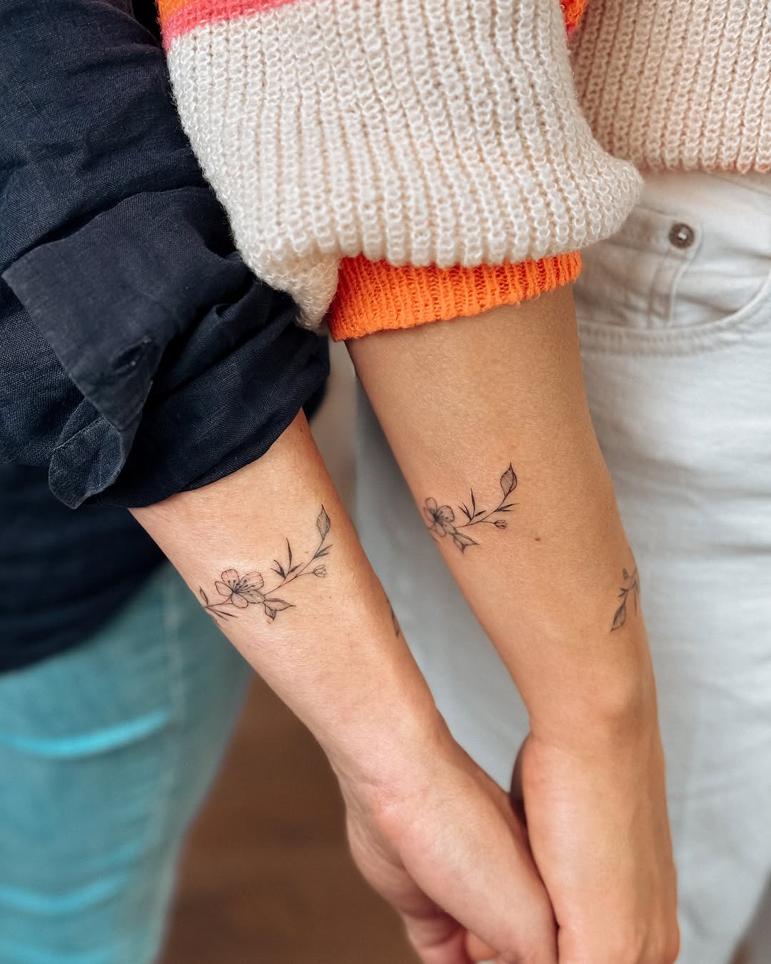 Charming floral bracelet tattoo designs for couples