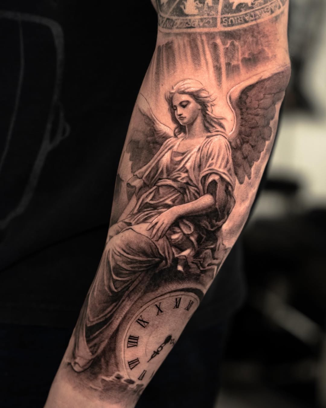 Stunning angel tattoo featuring a clock motif