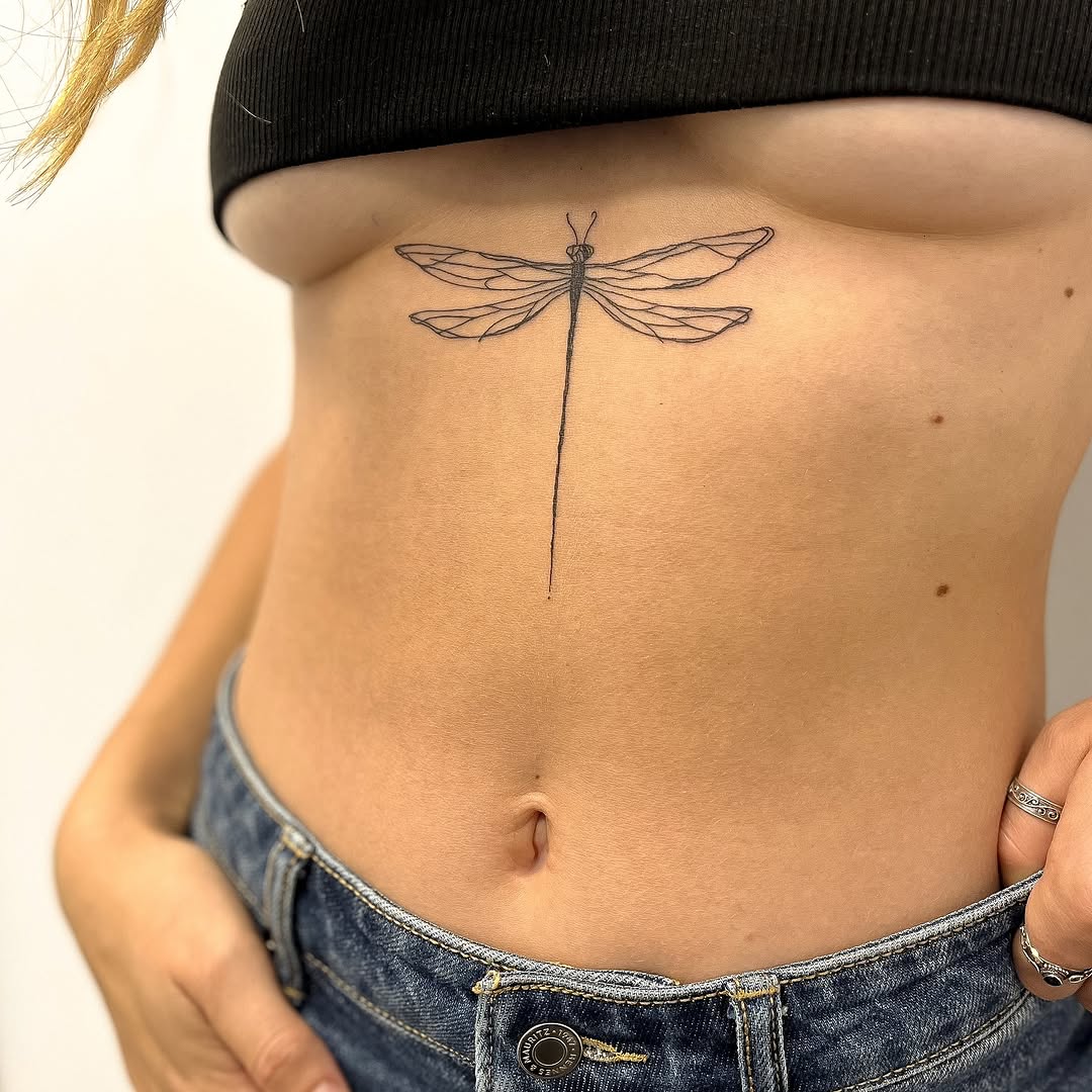 Elegant Minimalist Dragonfly Tattoo on Skin