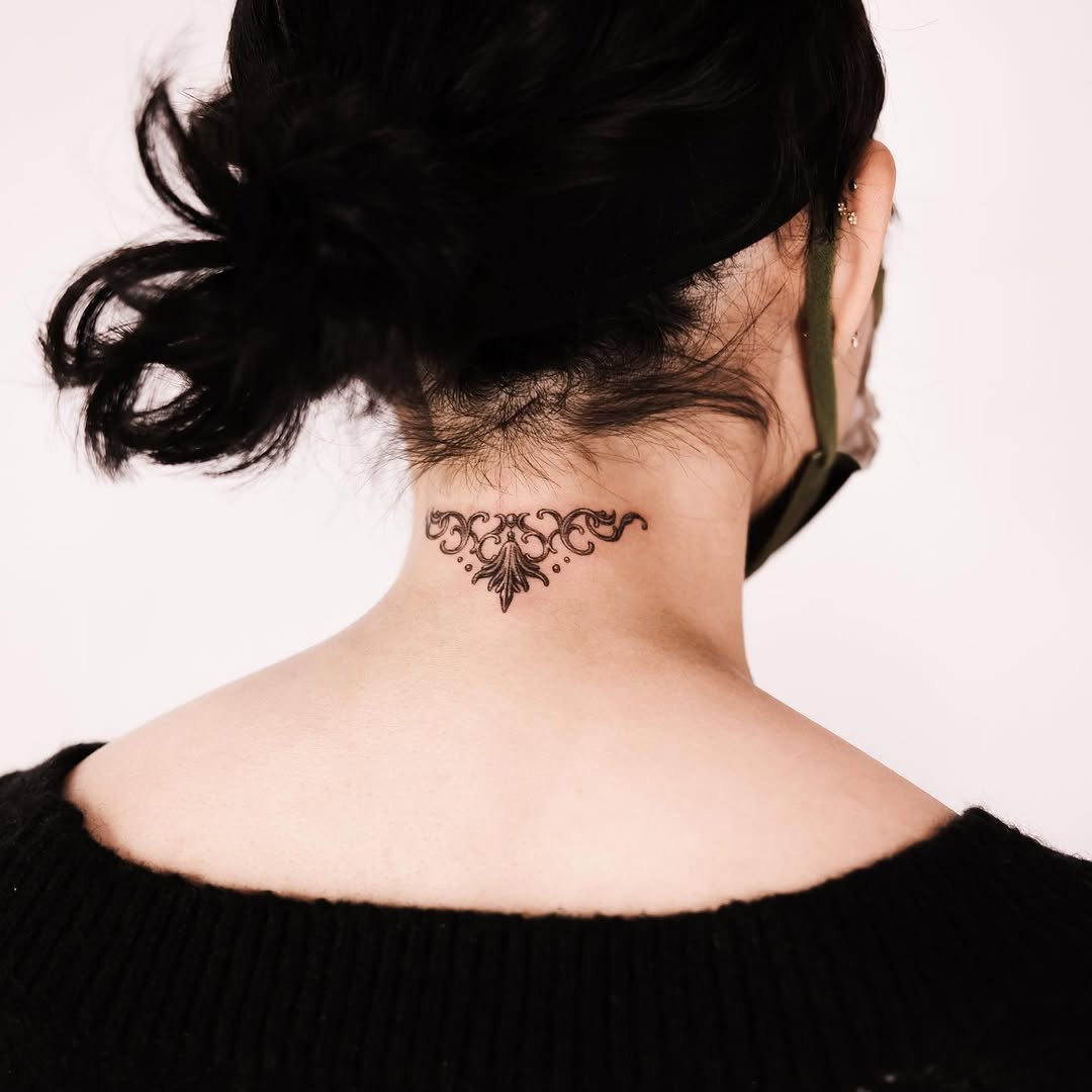 Beautiful Floral Tattoo on the Neck