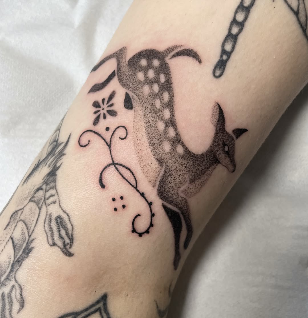 Stylish and simple feminine deer tattoo