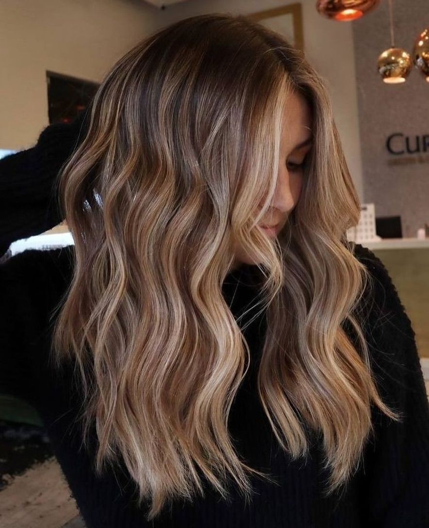 Stunning Wavy Golden Brunette