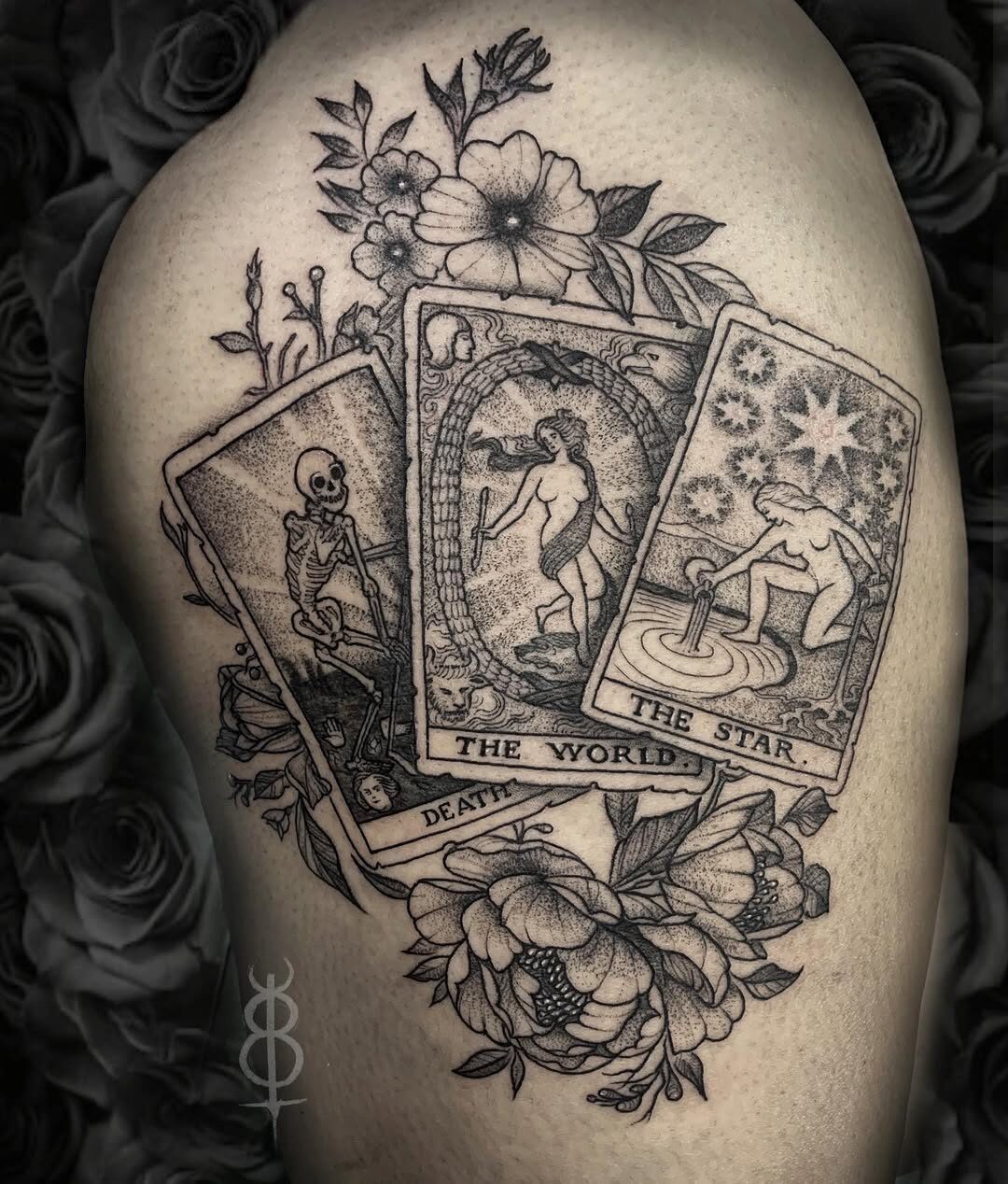 Intricate tarot card goth tattoo with flowers