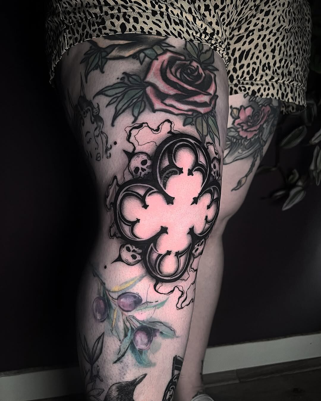 Bold Gothic Floral Tattoo Design on Leg