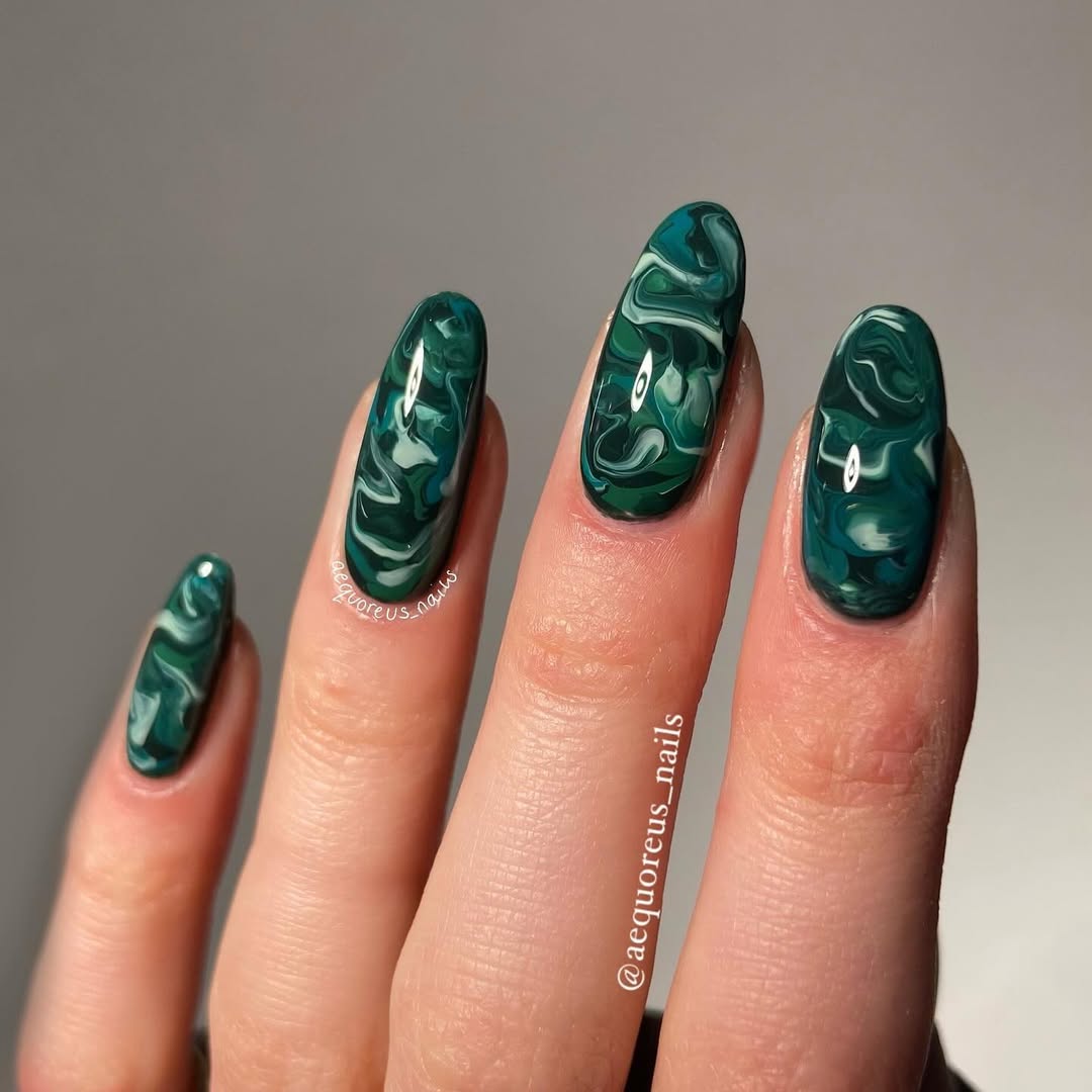 Stunning green marbled nail art inspiration