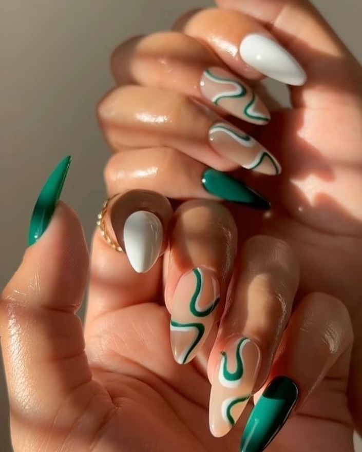 Stylish green and white nail art design