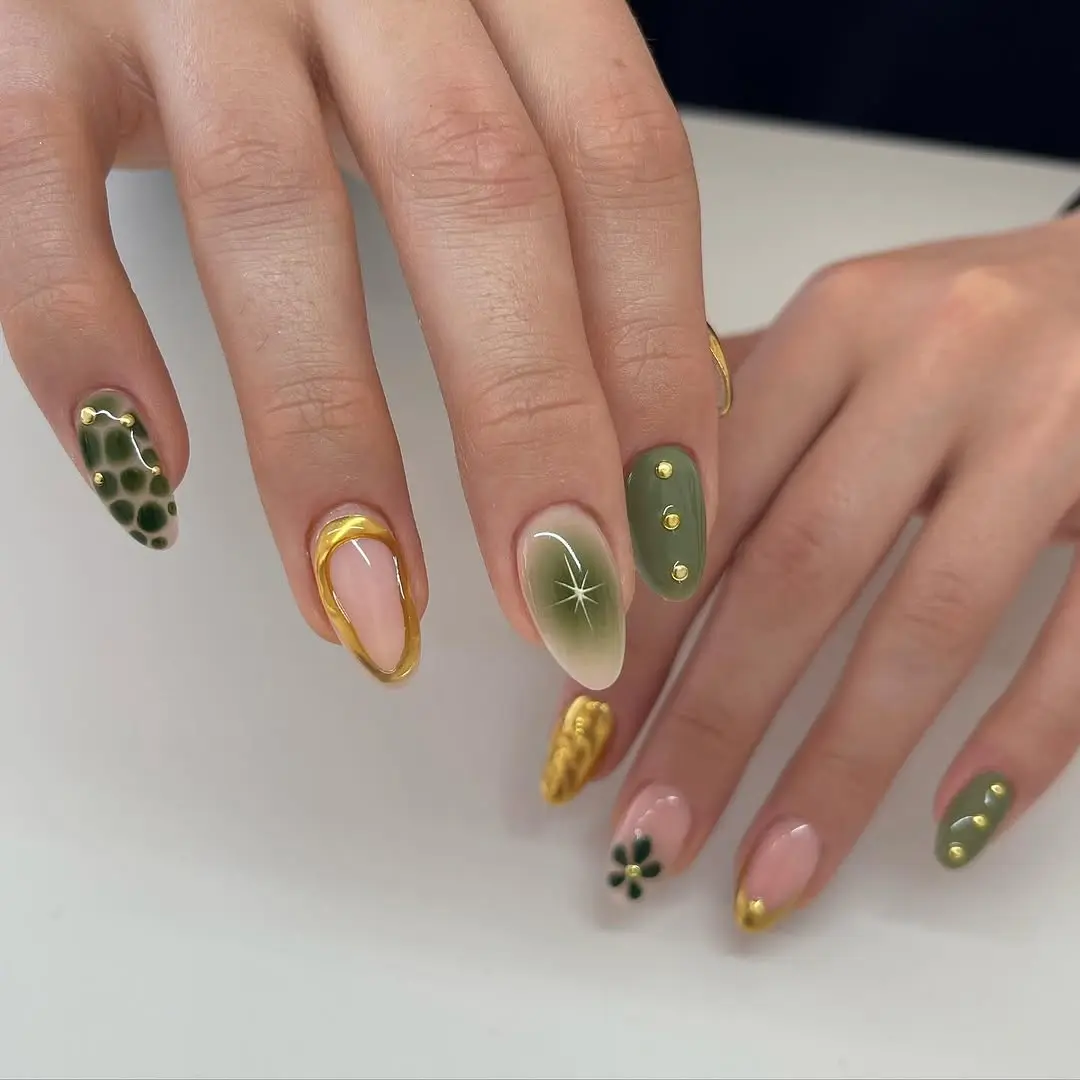 Elegant Green Nail Art with Gold Details