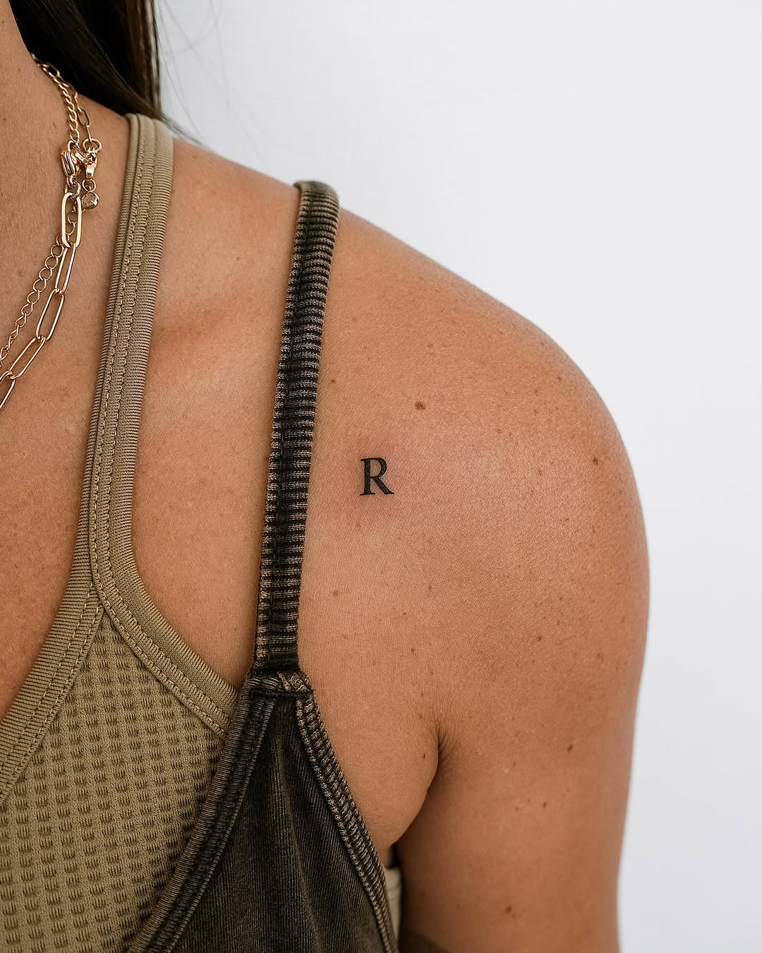 Elegant Initials Tattoo on Shoulder Design