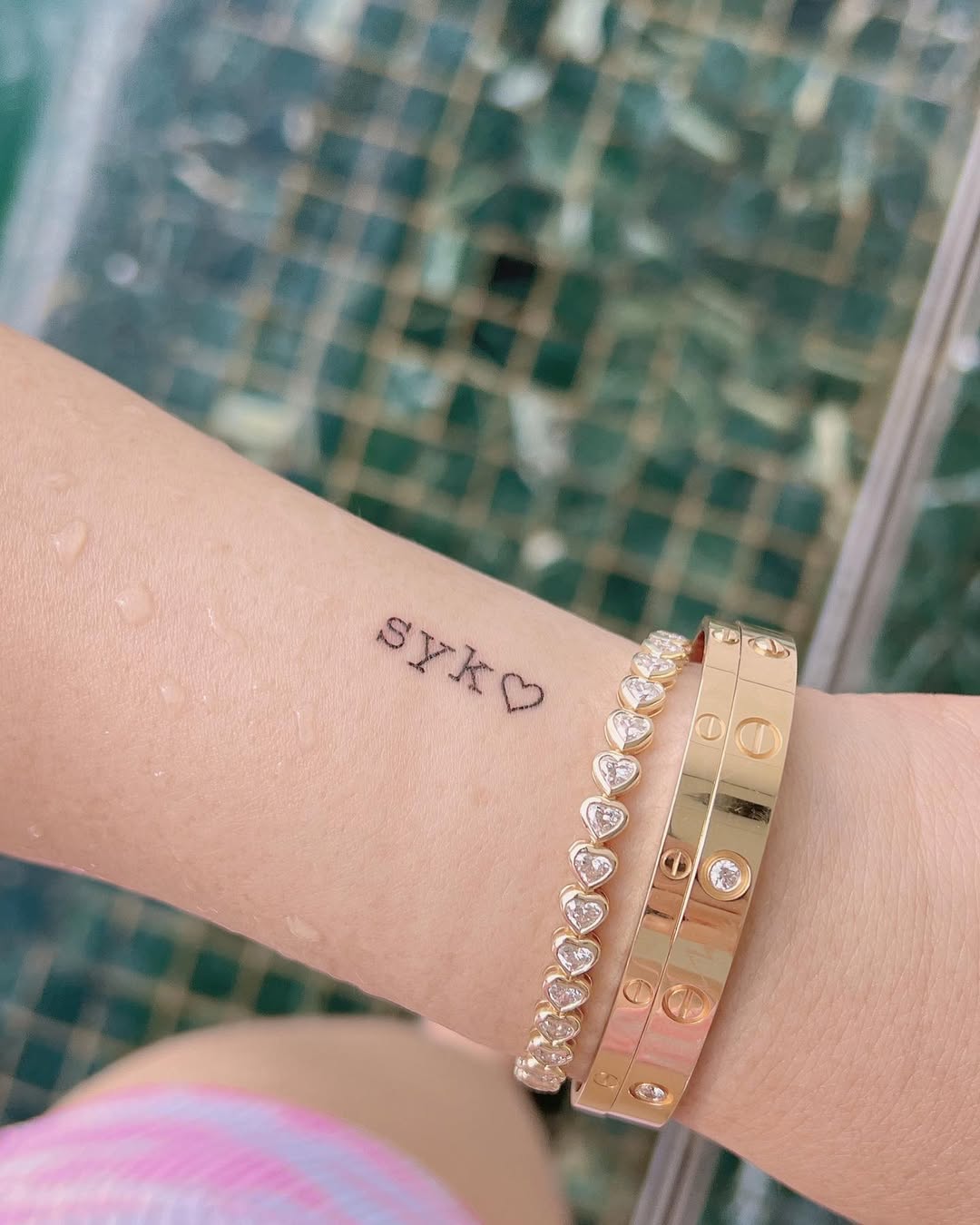 Stylish Initials Tattoo on Delicate Wrist