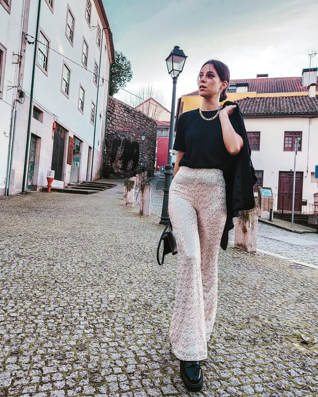 Chic winter look with sparkling flared pants