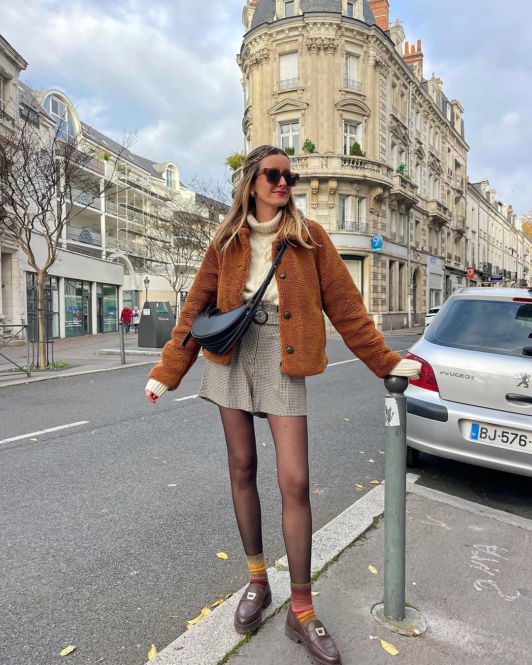 Stylish winter look featuring chic loafers