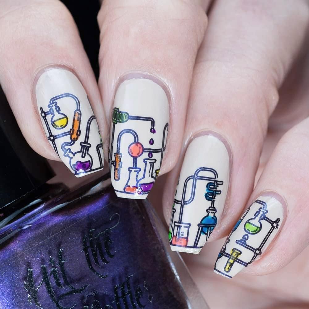 Colorful Chemistry Flasks on Neatly Painted Nails