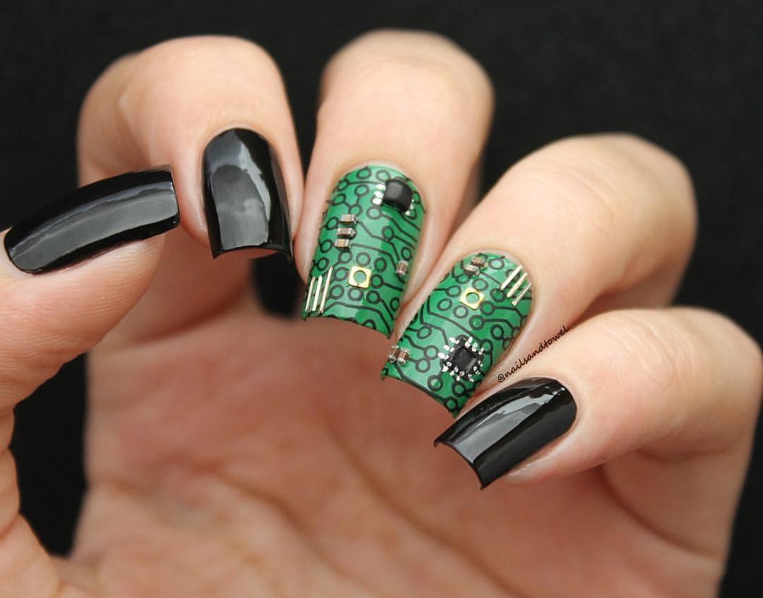 Circuit board-inspired nail art in vibrant colors