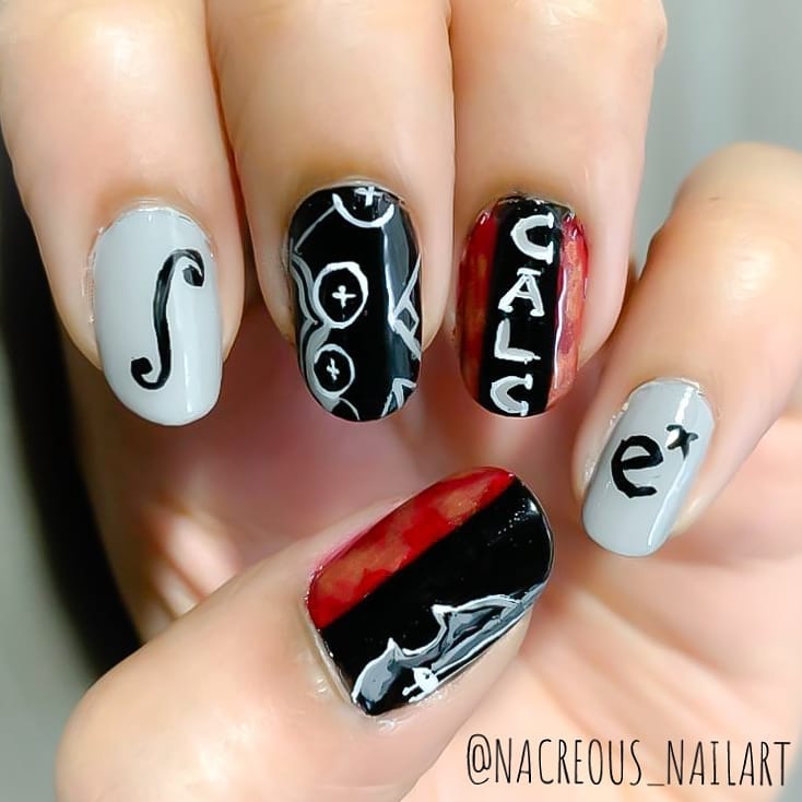 Chic math-inspired nail art with calculus symbols