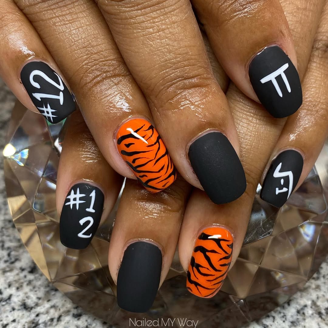 Bold nails with a math twist and tiger stripes