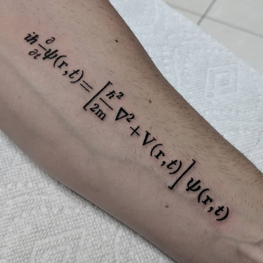 Intriguing quantum mechanics equation tattoo