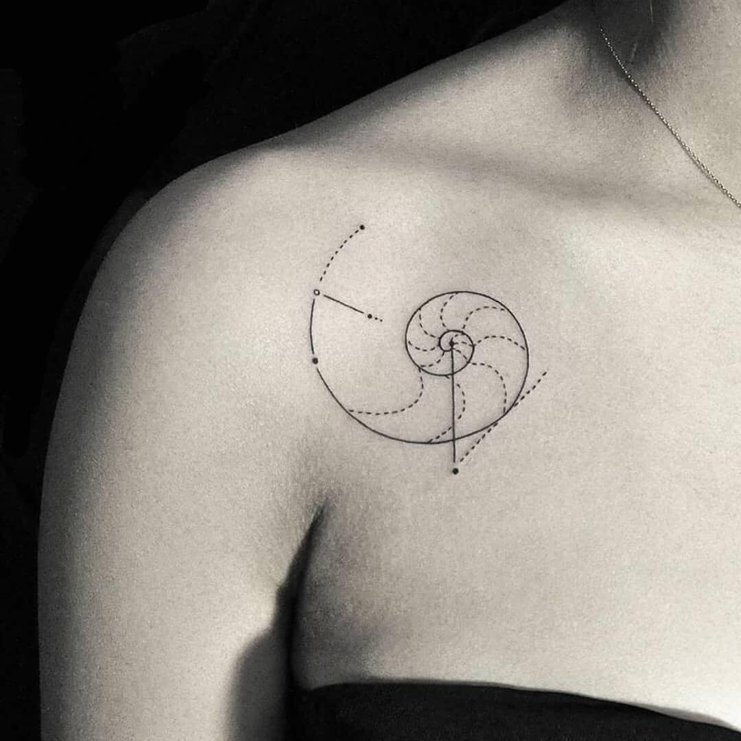 Elegant Fibonacci spiral tattoo on shoulder