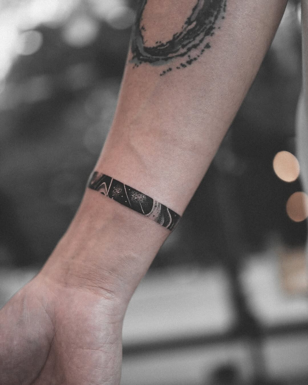 Elegant Minimalism: The Black Band Tattoo