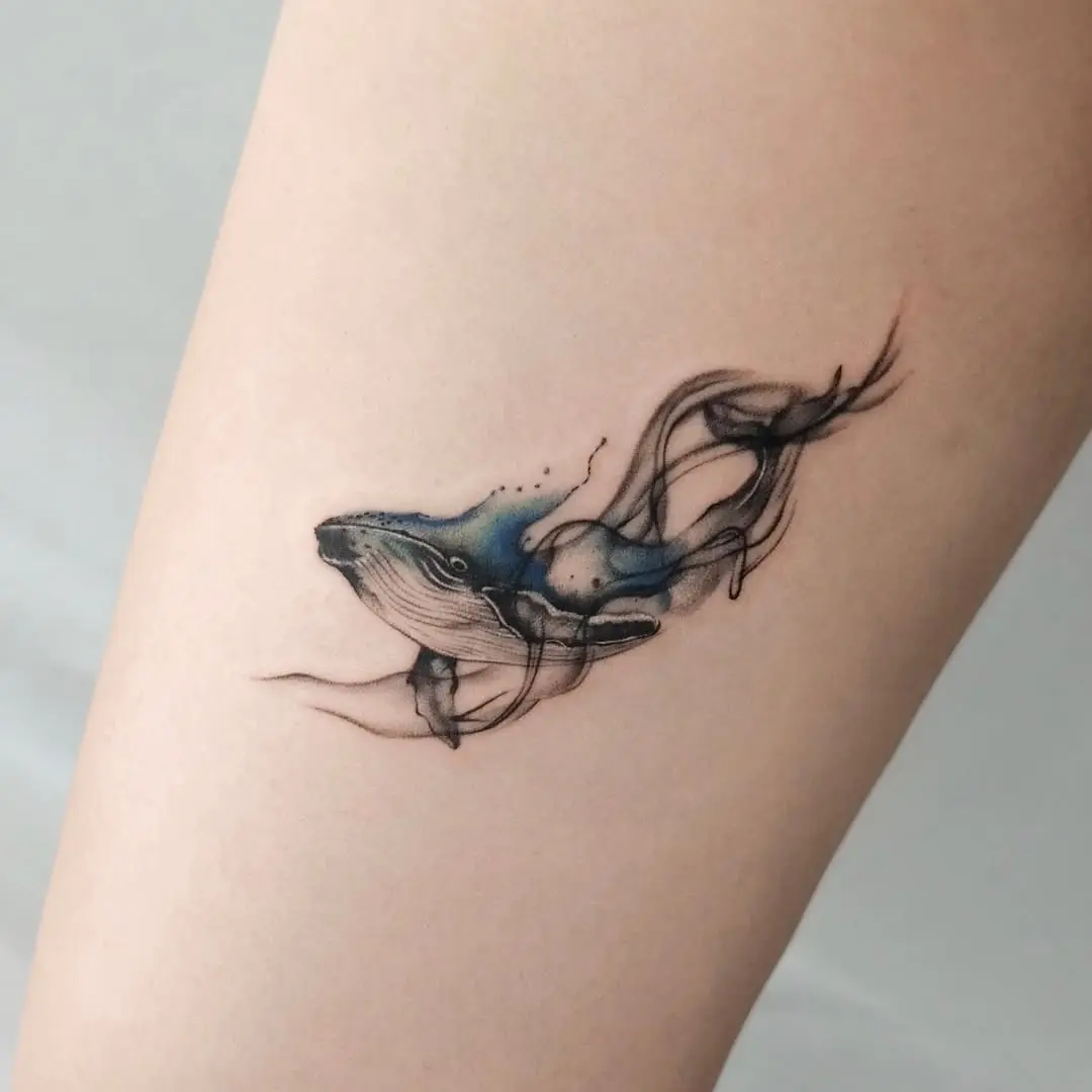 Elegant Whale Tattoo with Flowing Lines