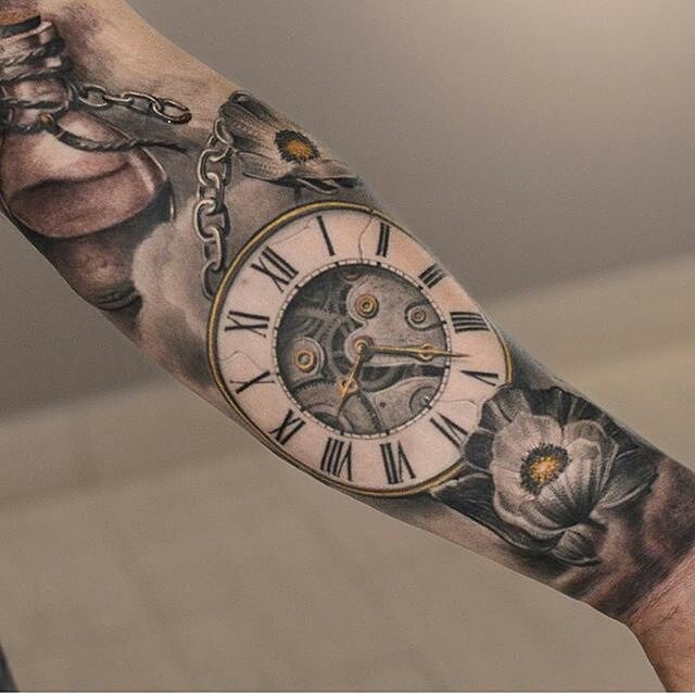 ornate-clock-and-flower-forearm-tattoo