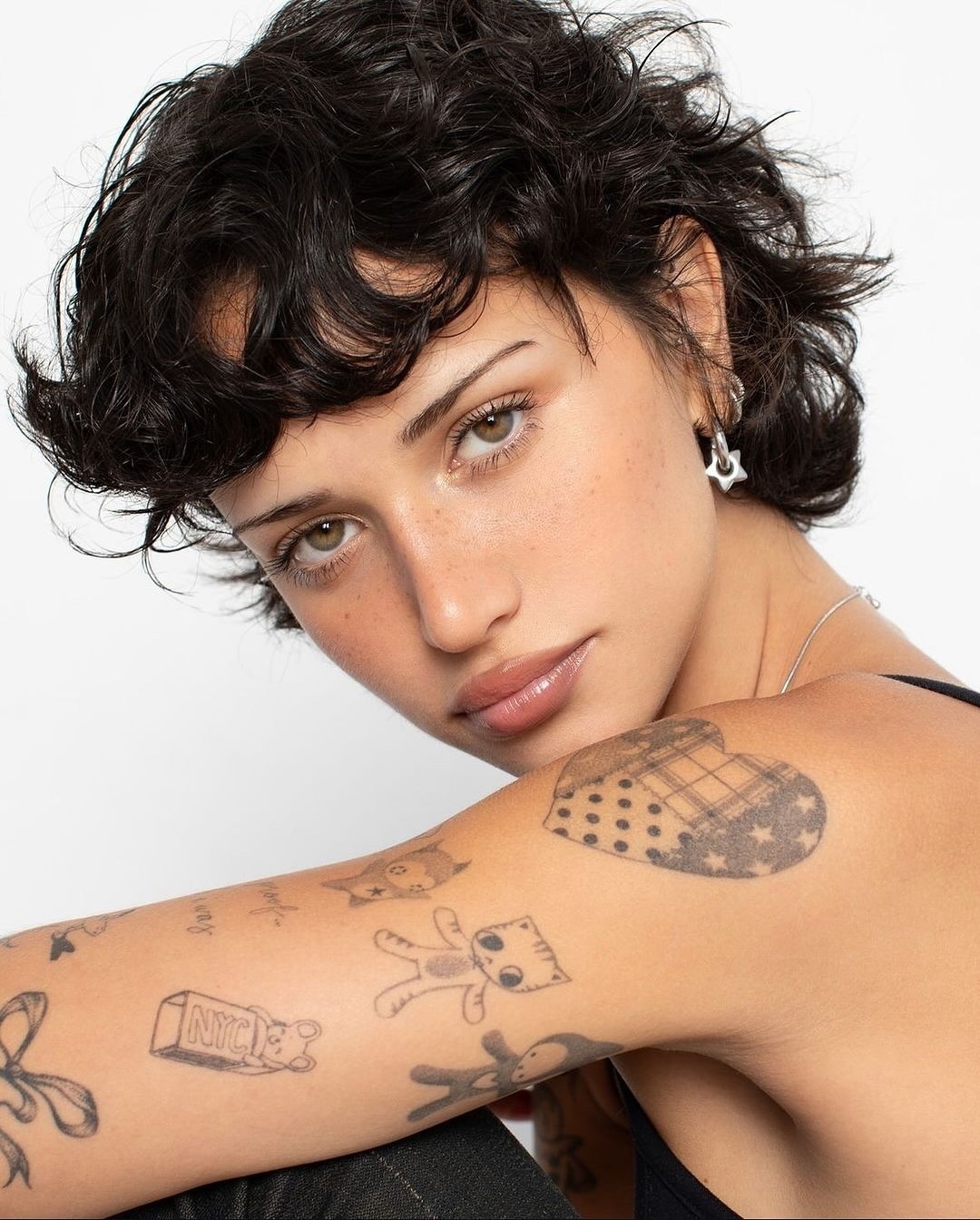 Chic Pixie Bob Hairstyle with Tattoos