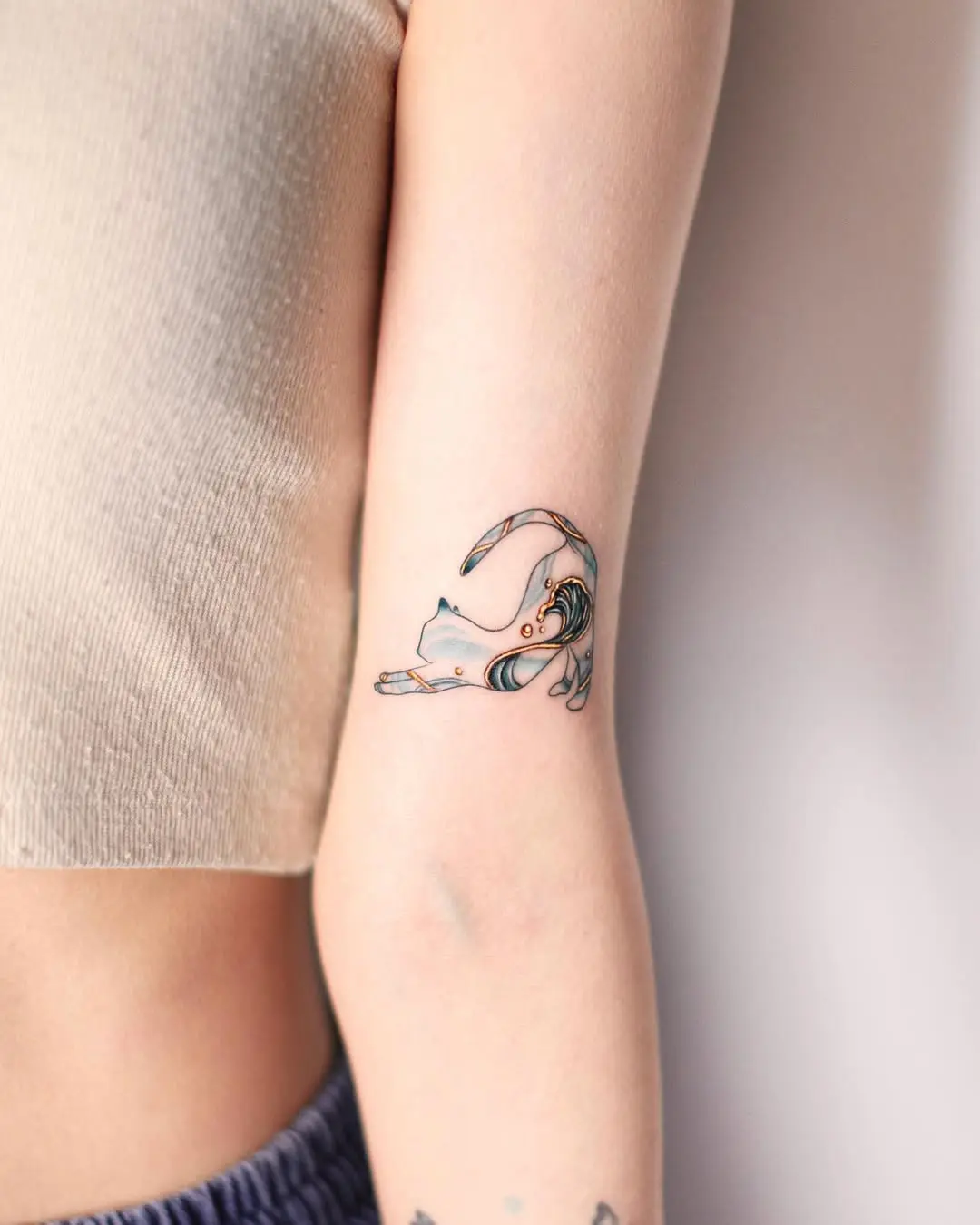 Playful Wave Tattoo
