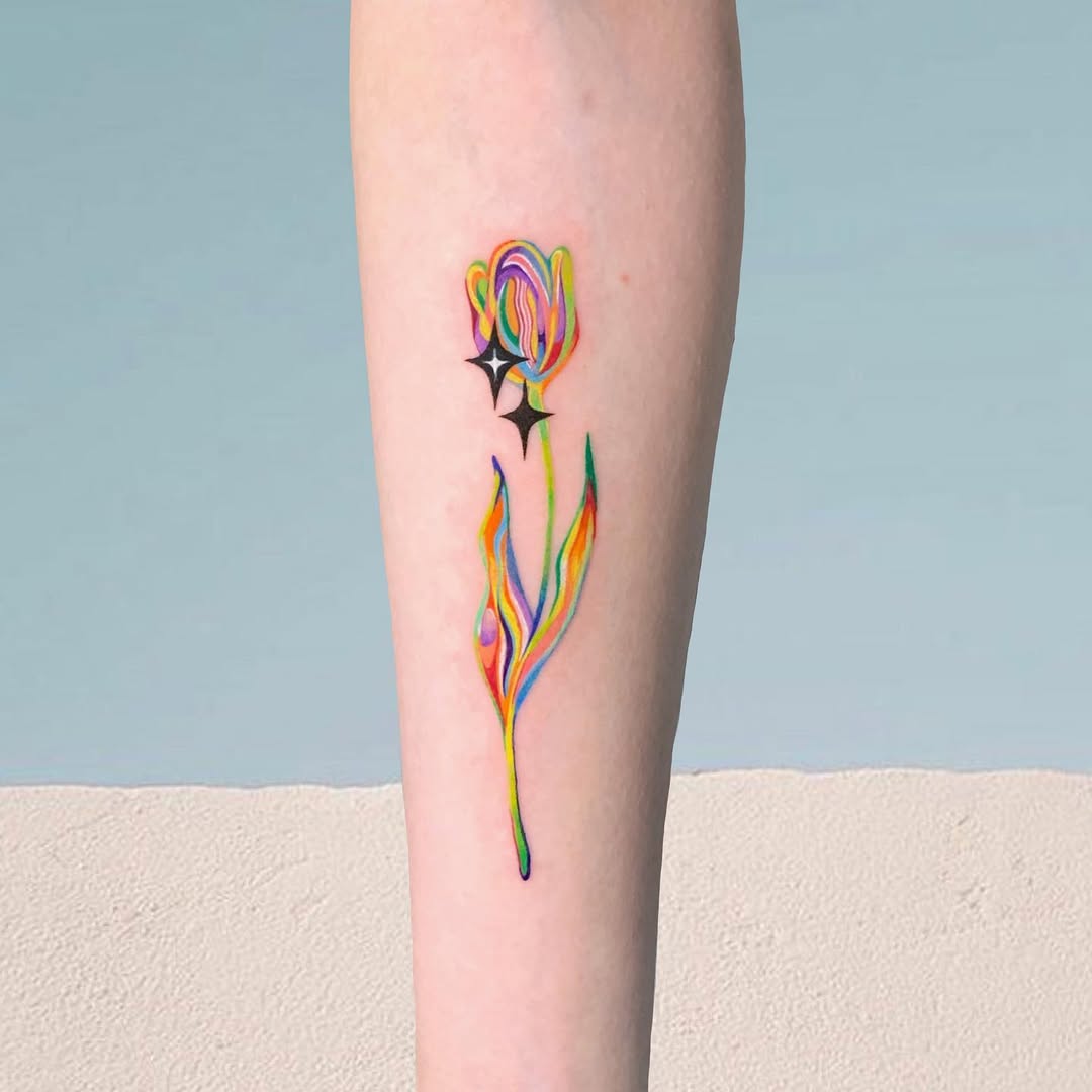 Vibrant Rainbow Flower Tattoo Inspiration