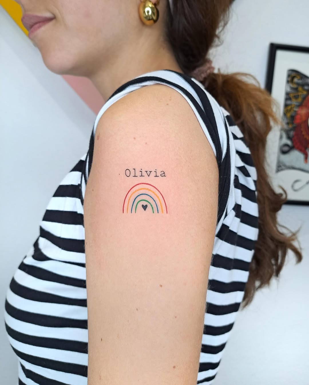 Charming Rainbow Tattoo With Personal Touch