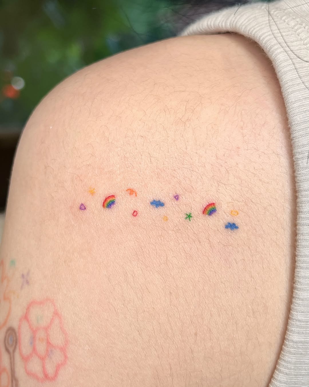 Delicate Rainbow Tattoo Design on Skin