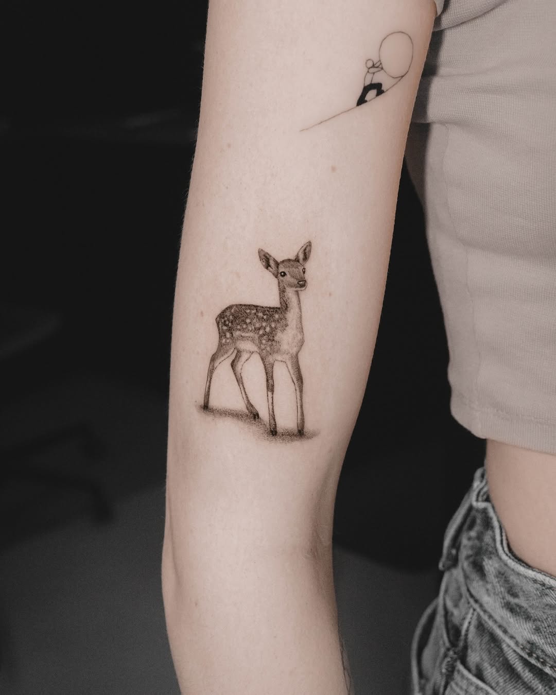 Charming realistic small deer tattoo on arm