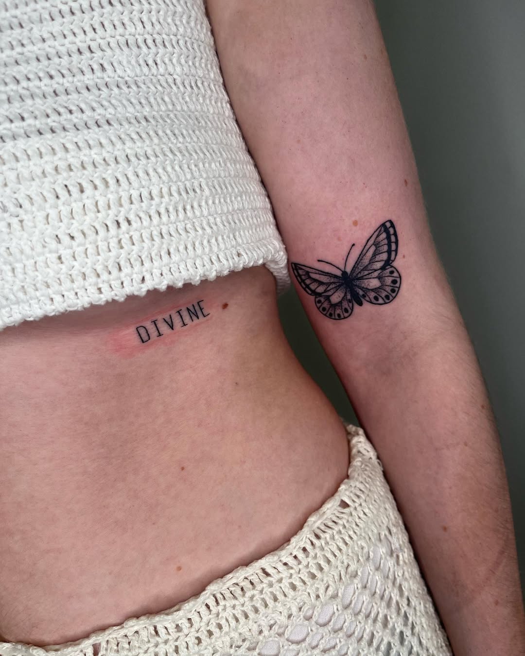 Stunning Rib Tattoo with Butterfly Design