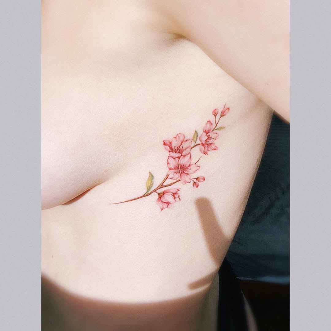 Elegant Floral Rib Tattoo Design for Inspiration