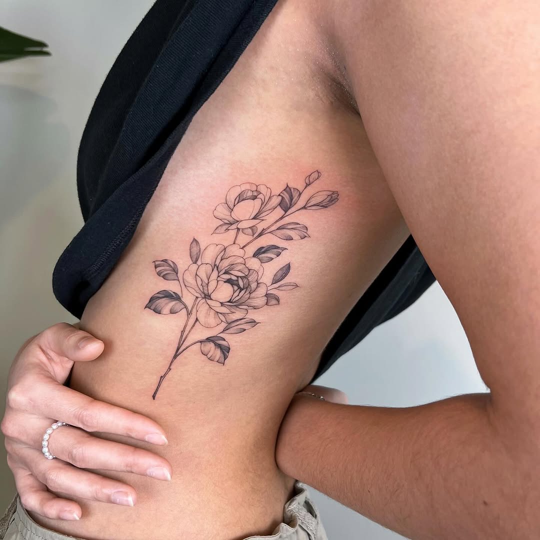 Stunning Floral Rib Tattoo Design for Inspiration