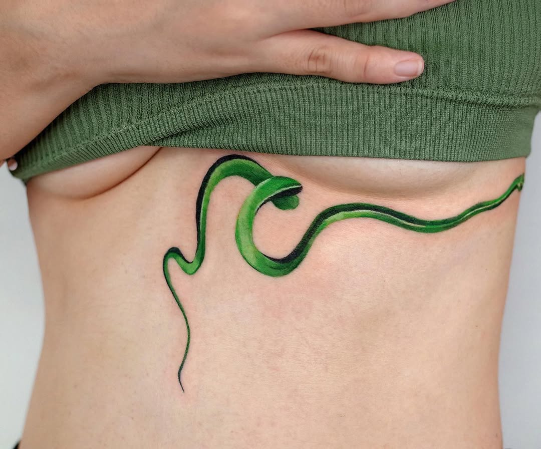 Stunning Green Snake Rib Tattoo Design