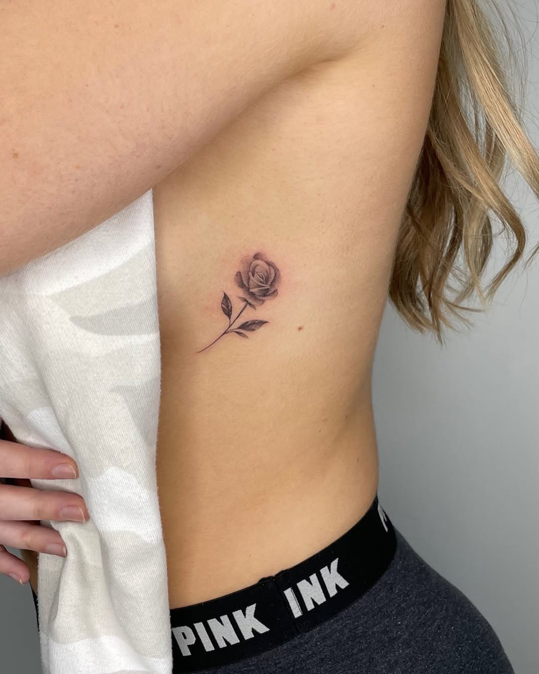 Elegant Rib Rose Tattoo Design Ideas