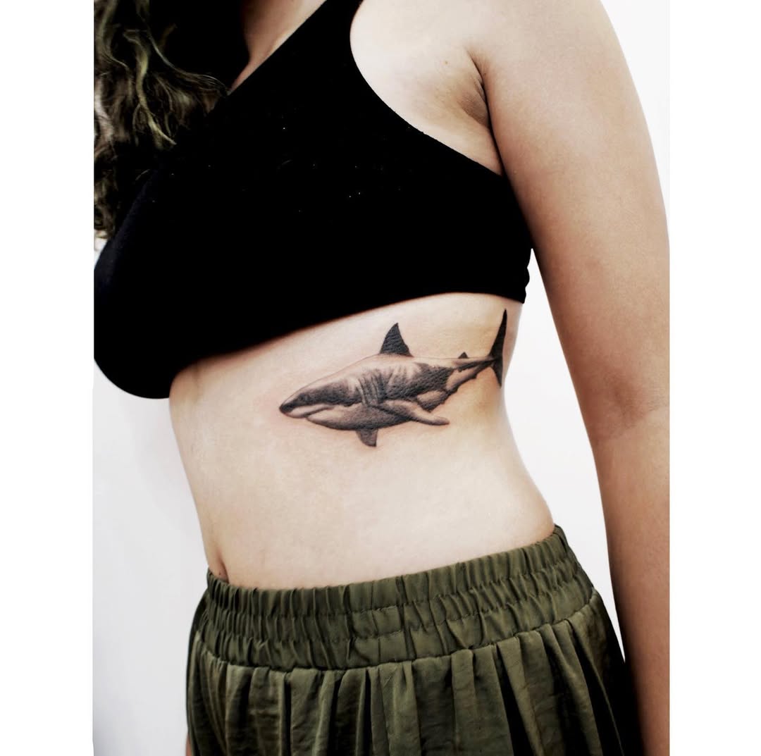 Stunning Rib Tattoo of a Majestic Shark