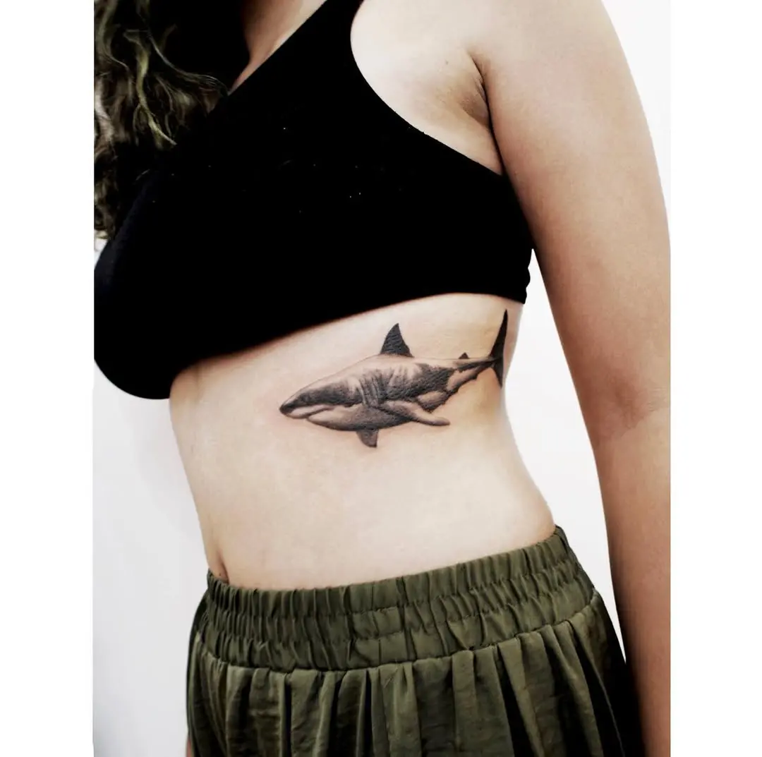 Stunning Rib Tattoo of a Majestic Shark