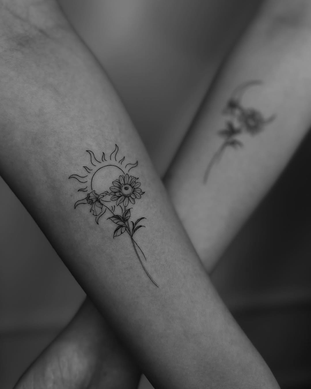 Beautiful sister tattoos with sun and flowers