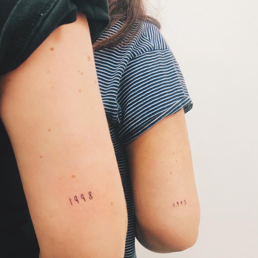 Meaningful birth year tattoos for sisters