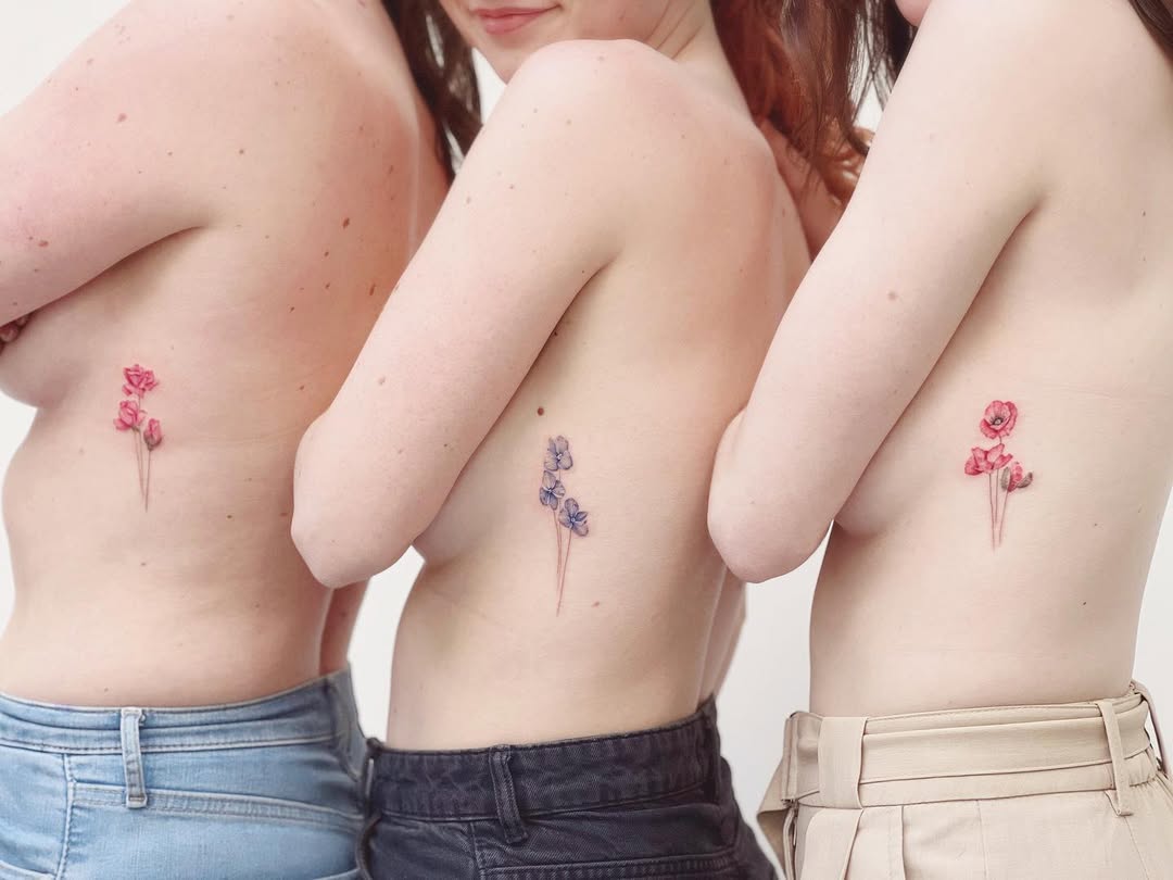 Floral Tattoos Symbolizing Sisterly Love