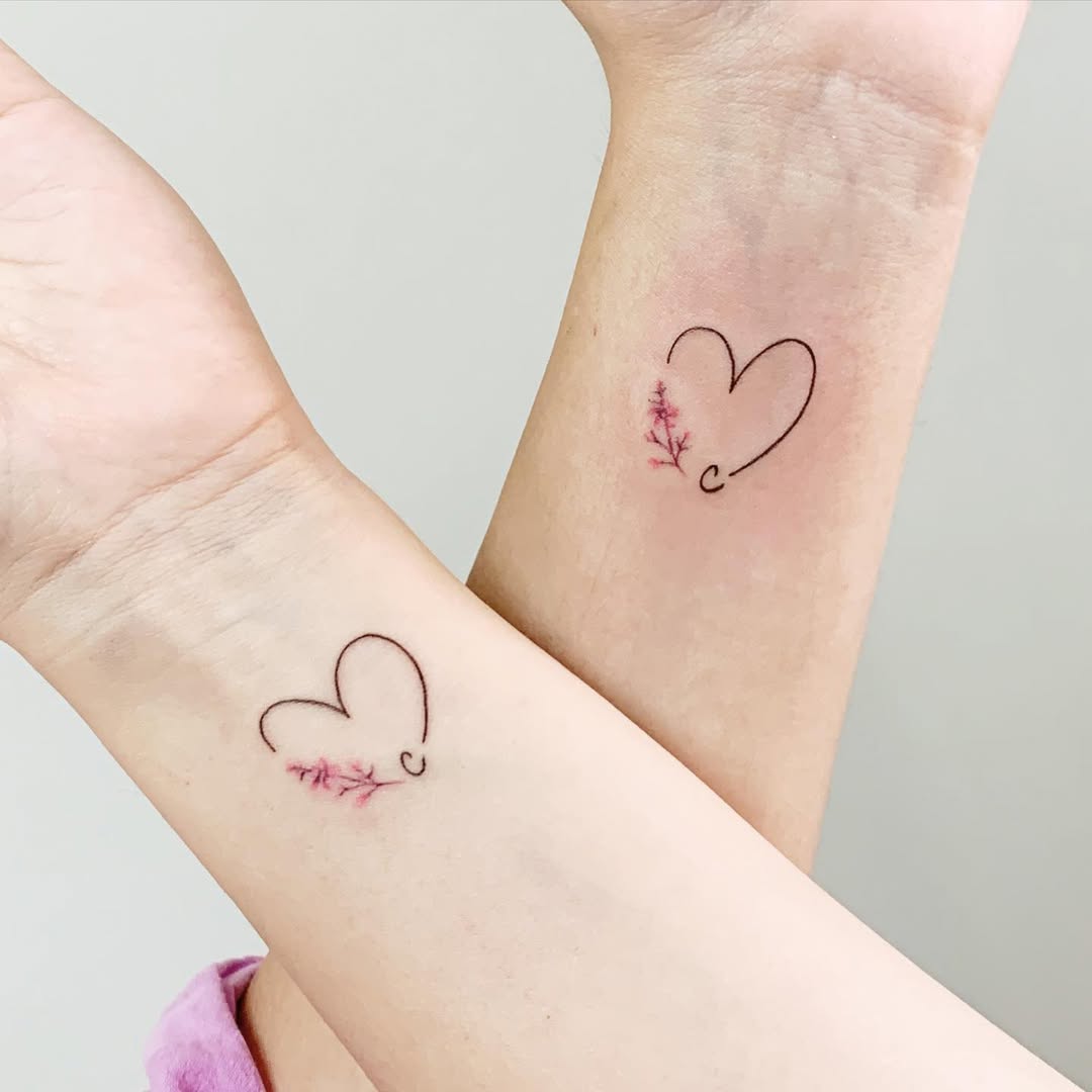 Delicate hearts with floral accents for sisters