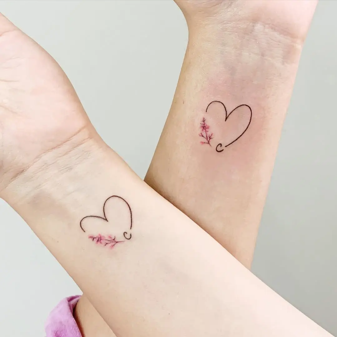 Delicate hearts with floral accents for sisters