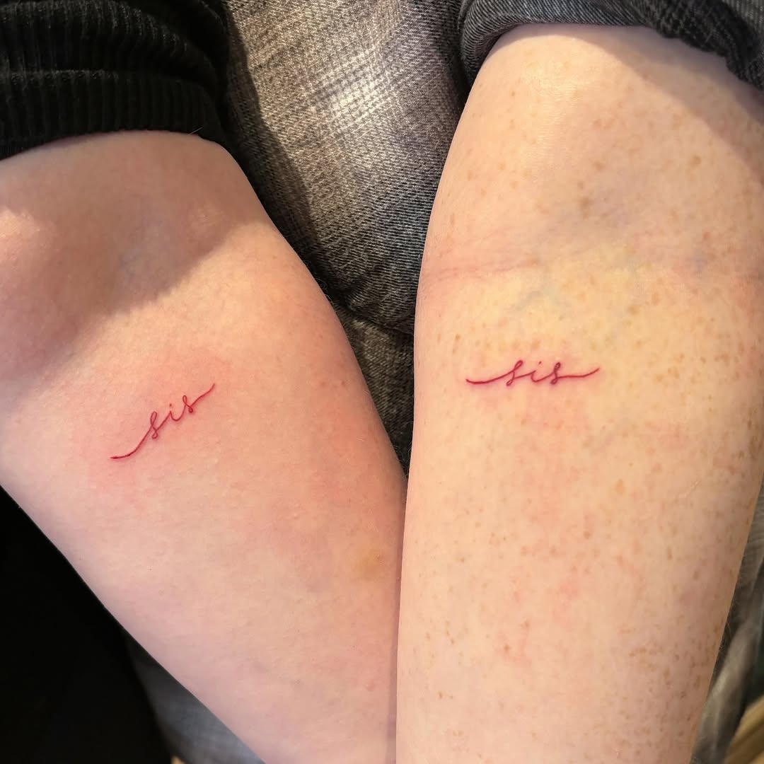 Delicate script tattoos symbolizing sisterhood