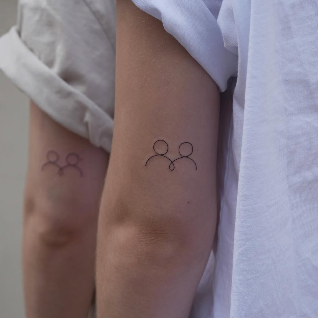 Minimalist sister connection tattoo design